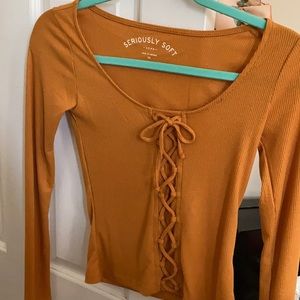 tight fitted yellow long sleeve top